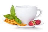 Cup of drink with crackers, mint and berries