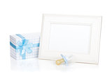 Photo frame with gift box and boy dummy