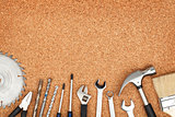 Set of tools on cork background
