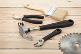 Set of tools on wood background