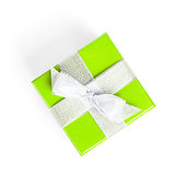 Green gift box with silver ribbon