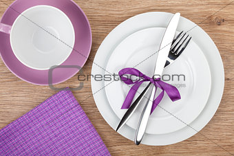 Fork with knife over plates