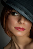 portrait of attractive elegant sexy woman with black hat