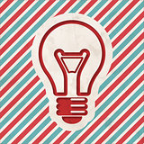 Light Bulb Icon on Striped Background.