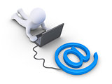 Person is using a computer connected to e-mail symbol