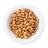heap of almond nuts in bowl