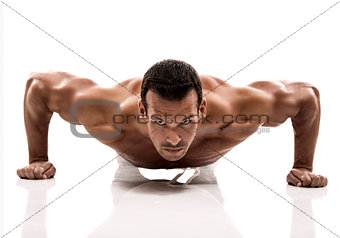 Muscle man making pushups