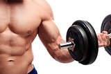 Bodybuilding. Strong man with a dumbbell