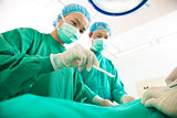 Professional aesthetic medicine surgeon operating  with scalpel