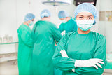confident female surgeons  crossed hands with  teams  