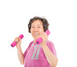 smiling senior woman working out with dumbbells