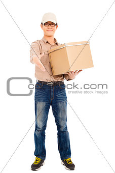 smiling  delivery man holding parcel and standing