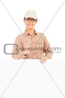 delivery man make  ok gesture with white board