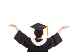  graduation student wearing a mortarboard and open hands