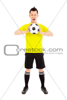 soccer player exclaimed and holding a soccer