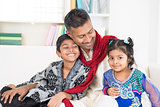 Indian father and children