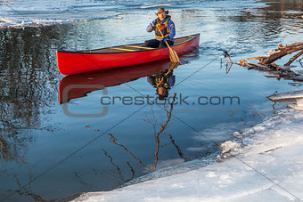canoe paddling in winter