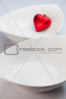 White bowls and red heart