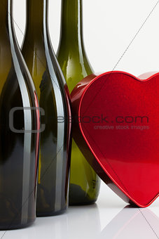 Bottles of wine and red heart