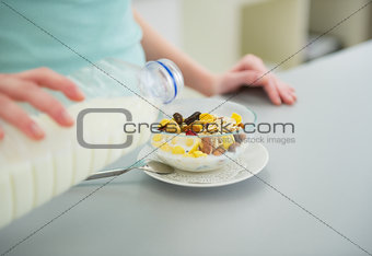 Closeup on young woman making healthy breakfast