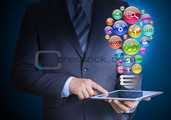 Businessman holding a tablet in his hands