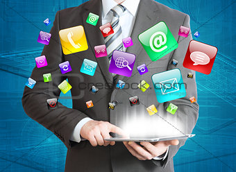 Man in suit holding tablet pc
