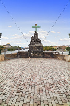 Statue of Pieta, in the Charles Bridge in Prague.