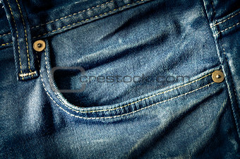 Detail of blue jeans pocket in vintage style