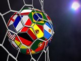Soccer Ball with Team Flags in Goals Net