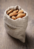 small sack bag full of almonds