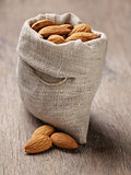 small sack bag full of almonds