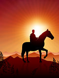 Horse and rider on sunset background