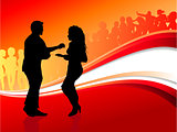 Sexy young couple dancing on summer party background