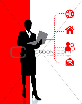 Business woman accessing internet on laptop