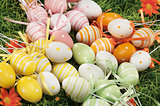 Easter eggs hidden in natural straw nest