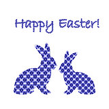 Silhouette of two Easter bunny rabbits decorated with cornflower
