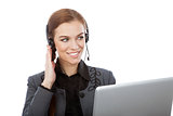 Picture of smiling female helpline operator with headphones. Iso