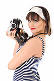 Beautiful girl holding old camera