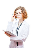 cute redhead doctor in lab coat and glasses with nothebook