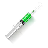  Syringe with green liquid