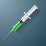 Syringe with green liquid