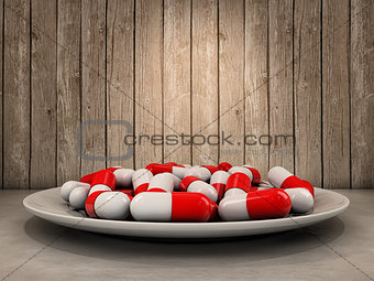 Pills on dish
