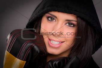 Beautiful Boxer Female in Black Hoodie Wearing Practice Gloves 