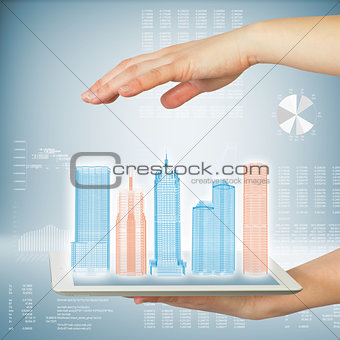 Hands holding tablet computer