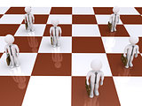 Businessmen as pawns on chessboard