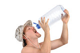 young man drinks from empty bottle