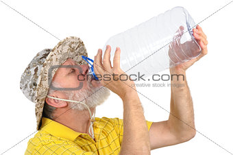senior man looking into empty bottle