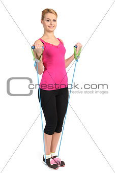 Female biceps exercise using rubber resistance band