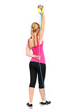Female triceps extention exercise using rubber resistance band
