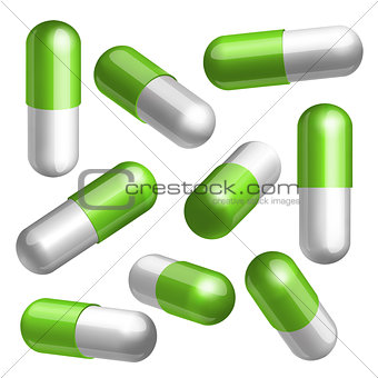 Set of green and white medical capsules in different positions